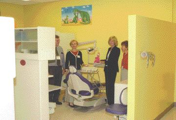 Dr. S. Hatibovic-Kofman, Chair of Paedodontic Dentistry gives a tour of the clinic during homecoming.