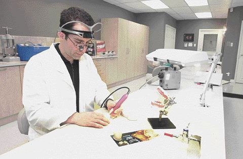 Hands-on typodont training with magnification and illumination.