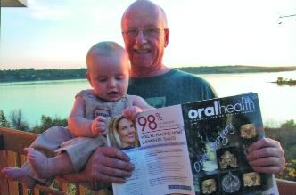 Dr. Jim Henderson makes a return visit to the pages of 'Show Us', this time with then 9-month-old son Jay, on the deck at Shore Acres, near Silton, SK.