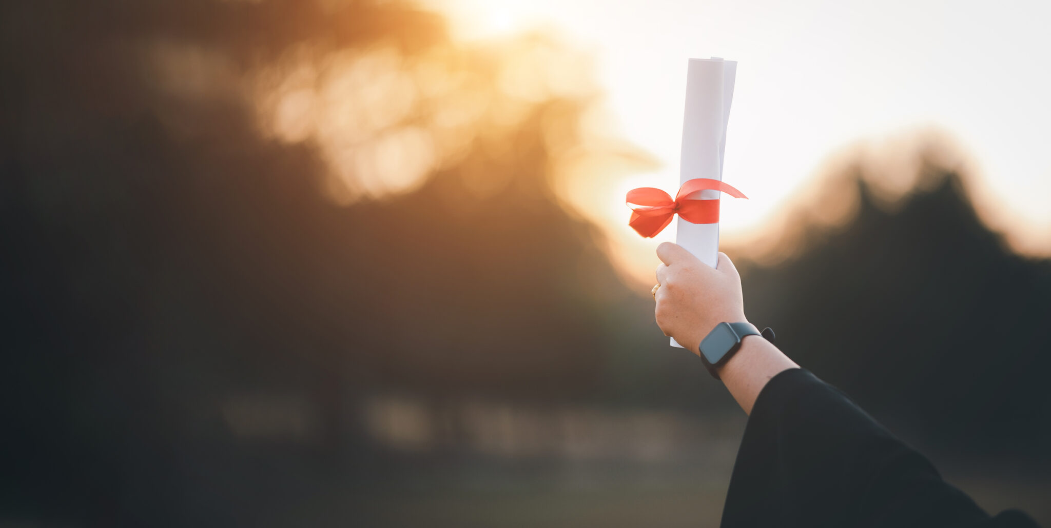 graduates wearing black hats holding university graduation certificates,Concept education congratulation. Graduation Ceremony ,Congratulated the graduates in University. alternate text for this image