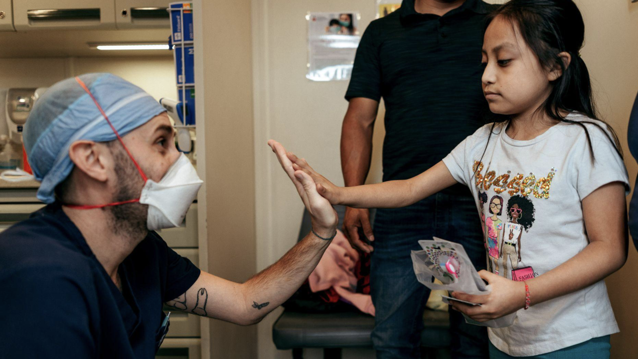 A young patient receives a high five from Dr. Dustin Root of Community Oral Health Initiatives in North Philadelphia, Pennsylvania. The organization is one of 55 members in the Dental Resource Program of America’s ToothFairy to receive dental burs from a donation from SS White worth more than $1 million. Since 2006, America’s ToothFairy has distributed more than $24.8 million worth of resources to help nonprofit clinics provide care to more children in need.