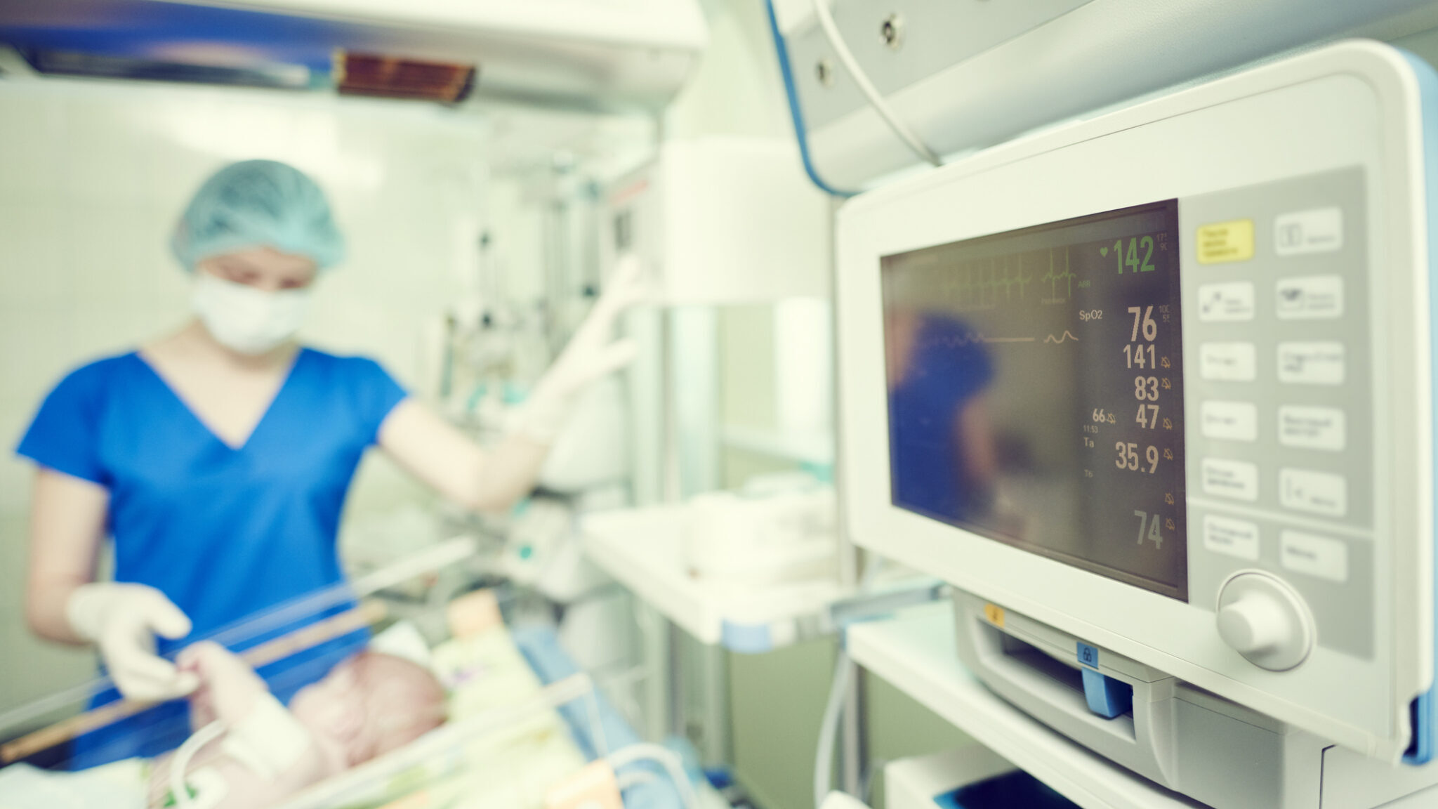 intensive care unit female doctor with baby infant alternate text for this image