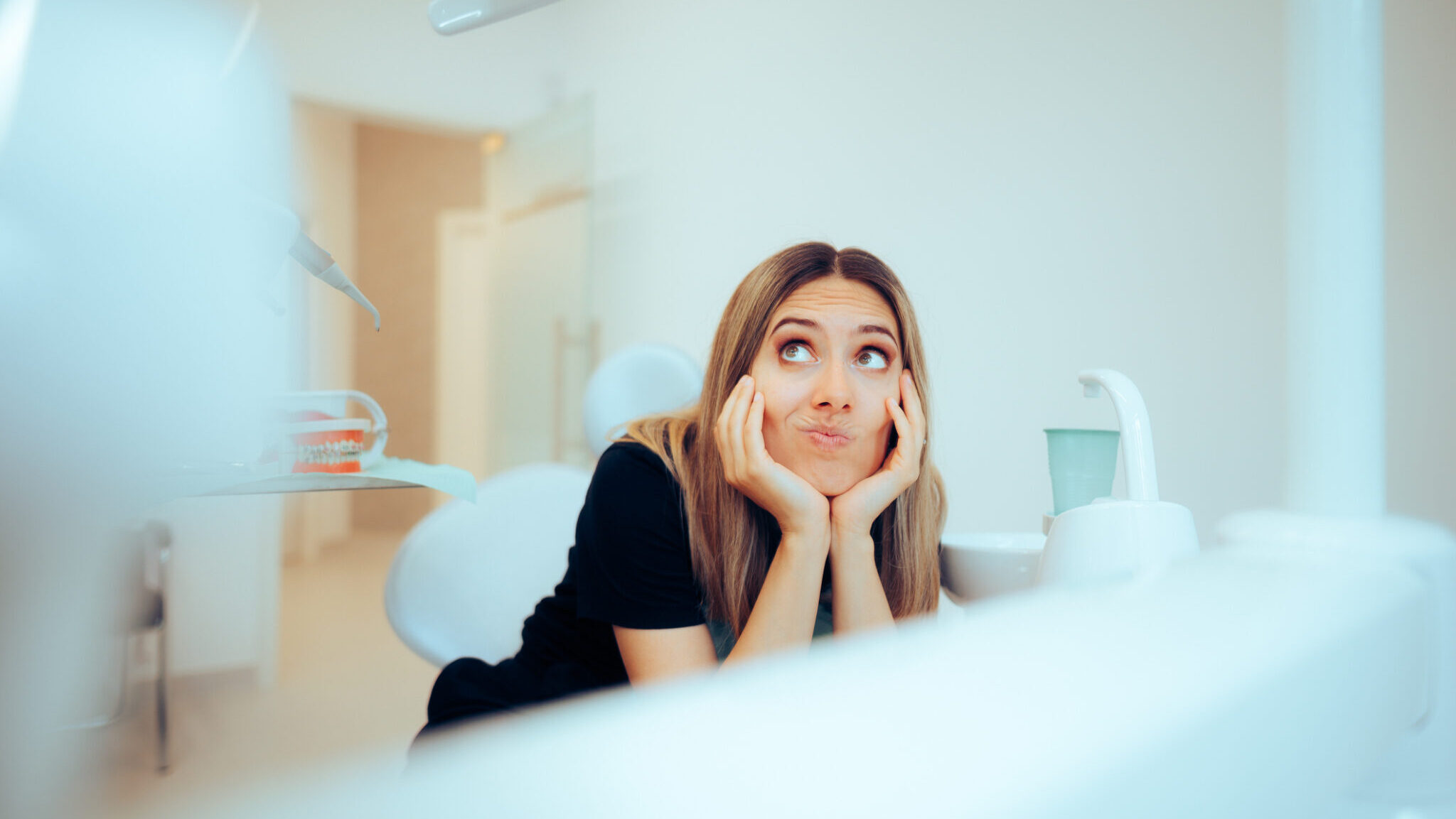 Stressed Patient Waiting in a Dental Office Feeling Fearful alternate text for this image