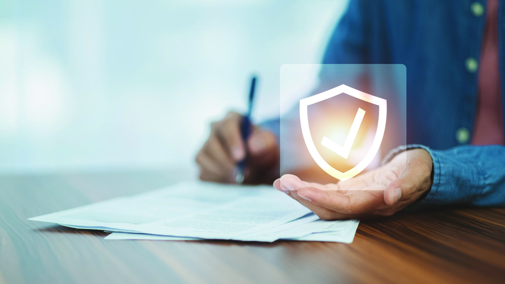 Man signature document for life insurance investment alternate text for this image