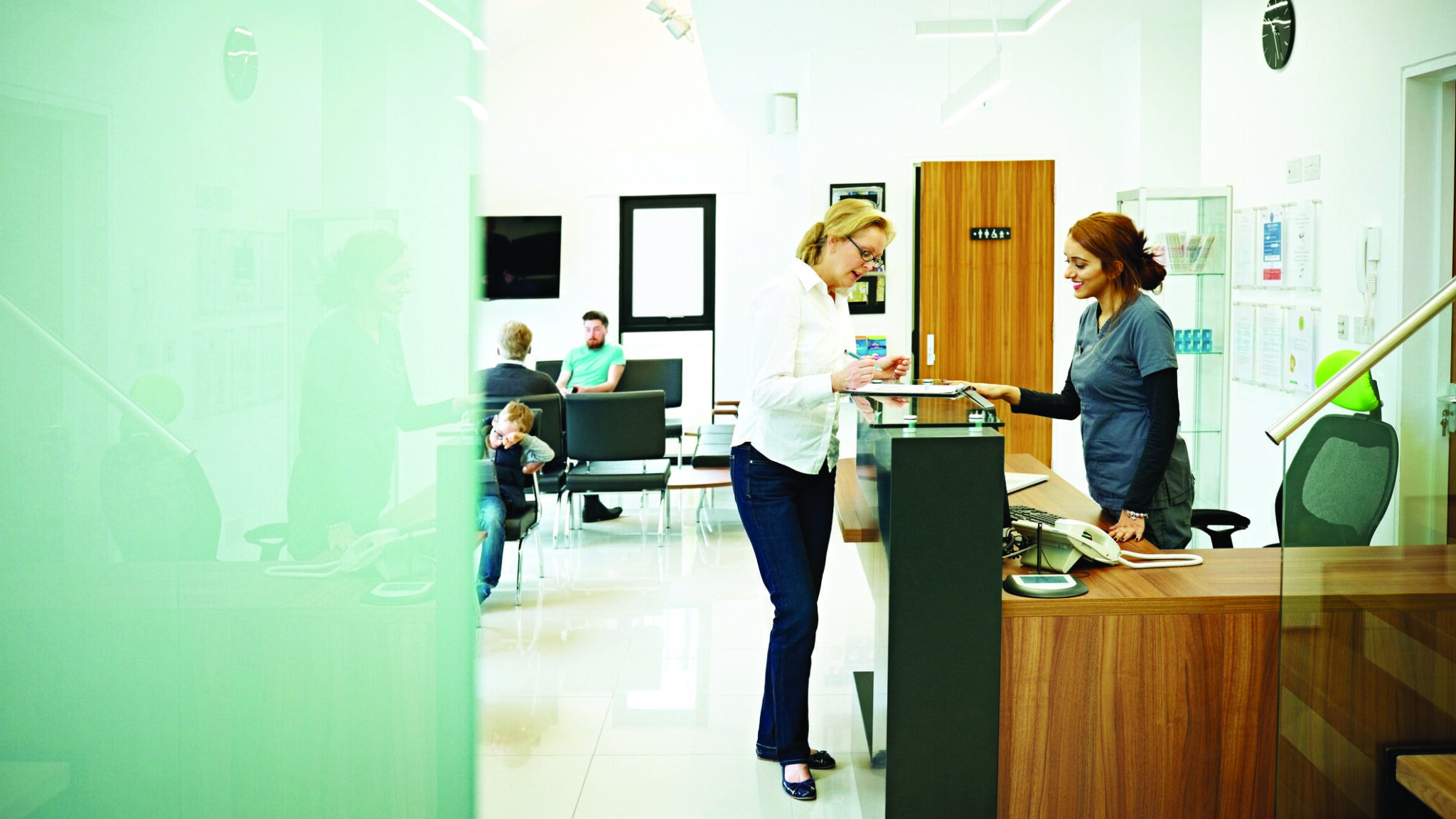 Mature female patient at dental clinic alternate text for this image