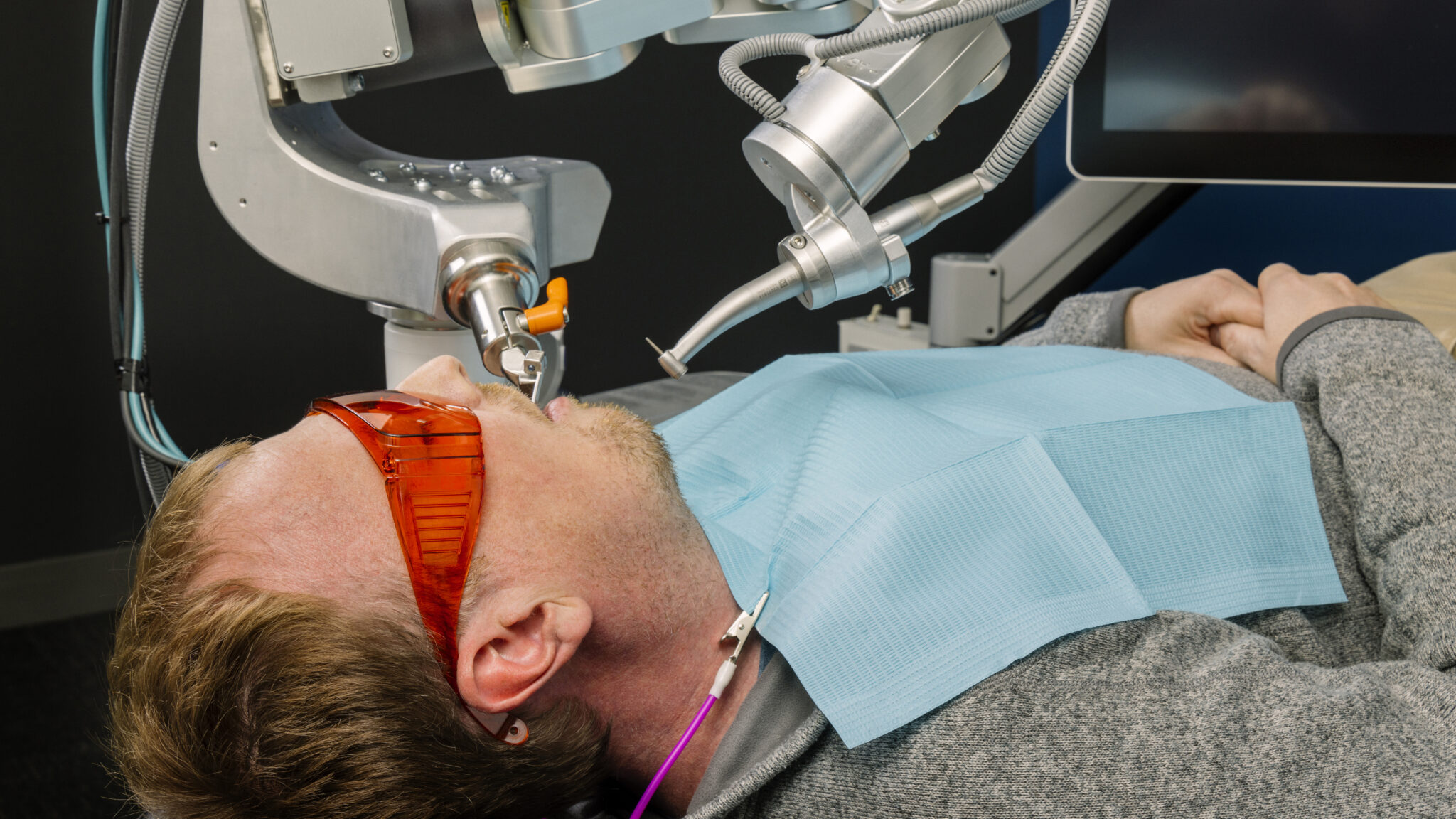 Perceptive's AI-driven robotic arm performing the world's first fully automated dental procedure.