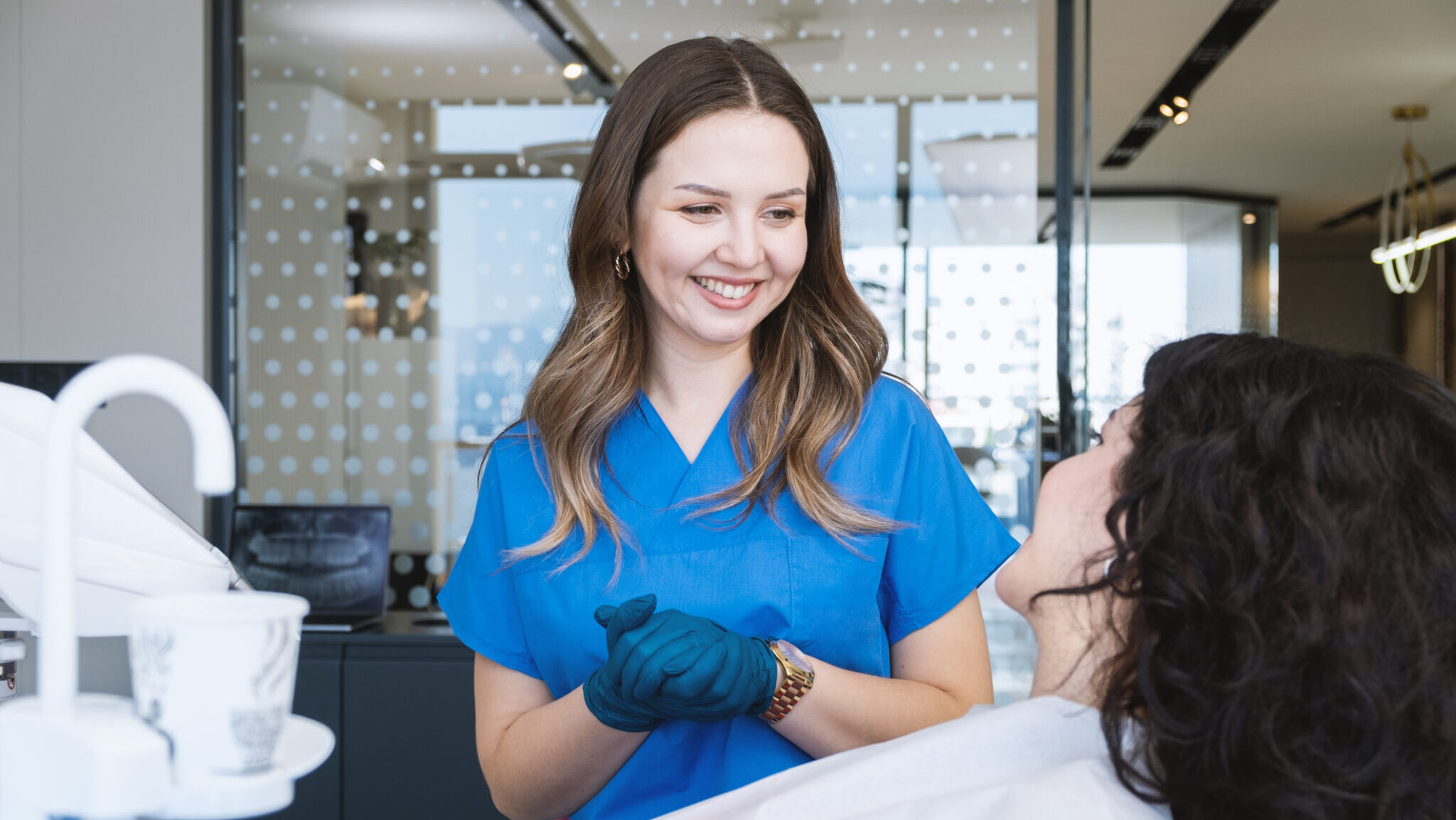 Happy Dentist With Patient alternate text for this image