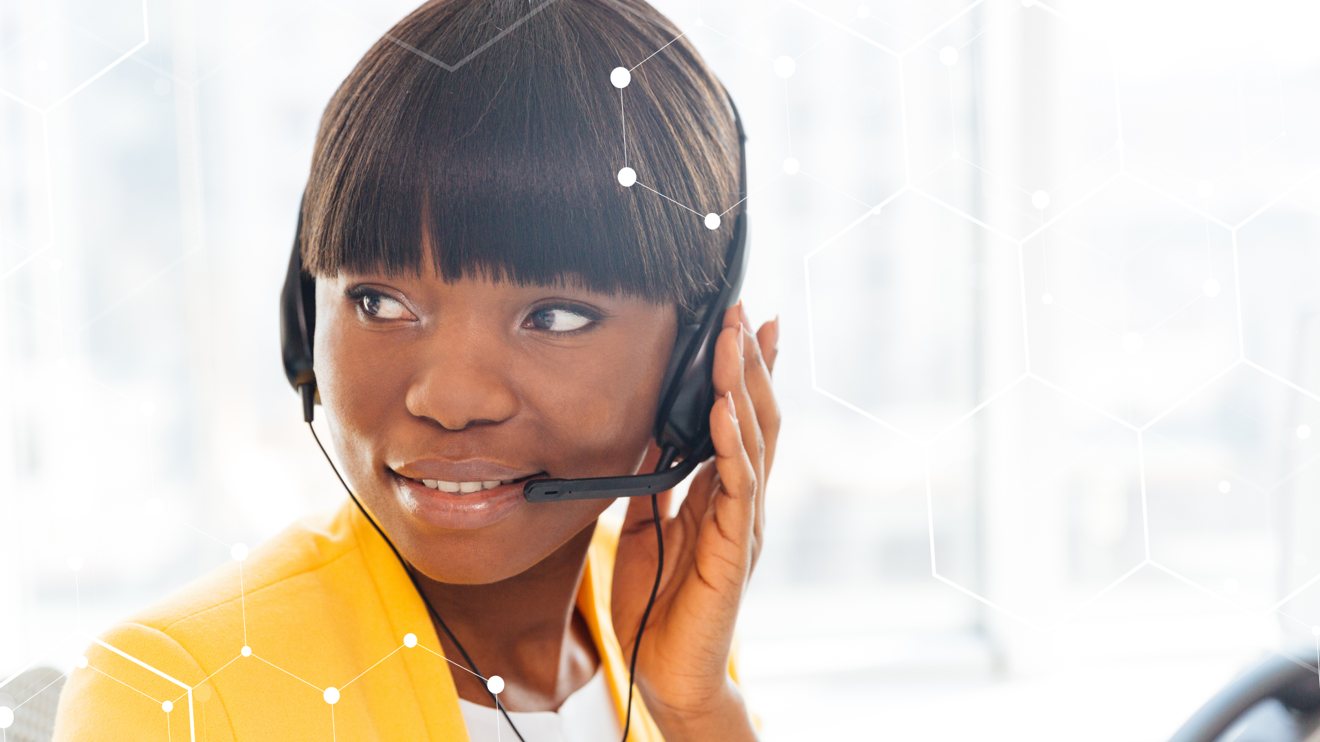 Woman answering phone via headset.