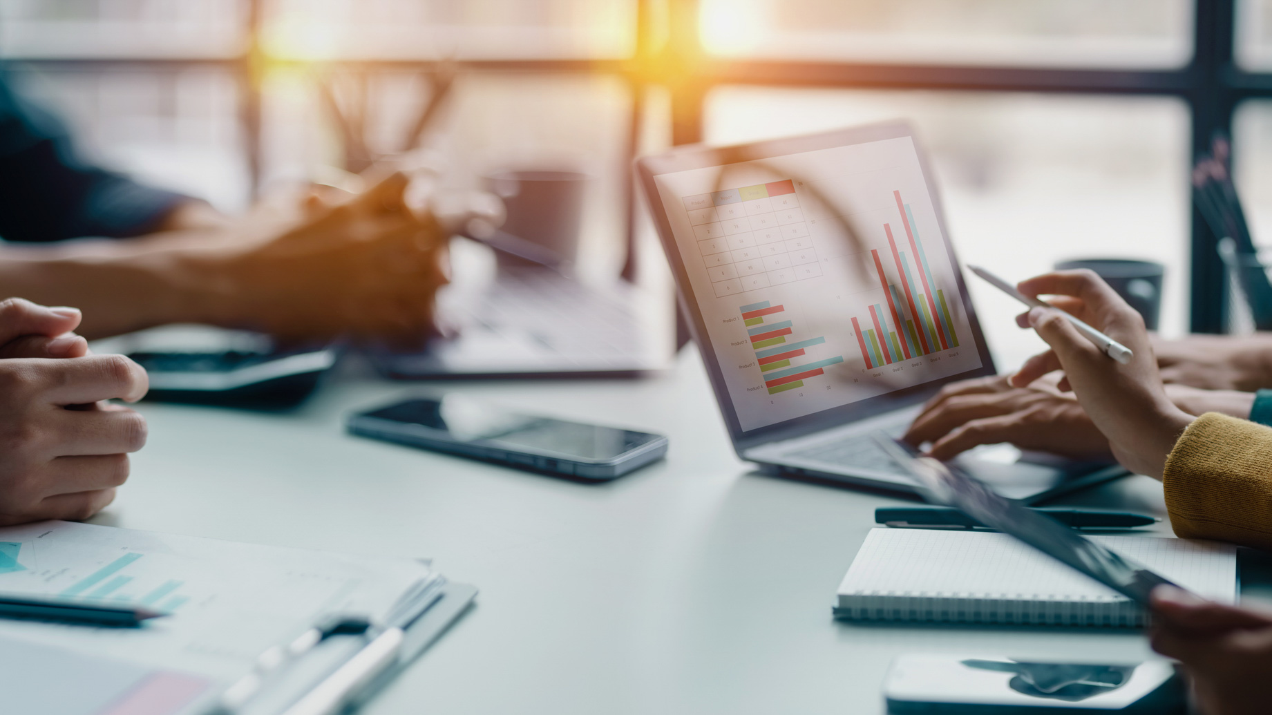 Technology and financial advisory services concept. Business teamwork and working on digital laptop computer. alternate text for this image